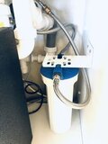 Waterfilter in gootsteenkast